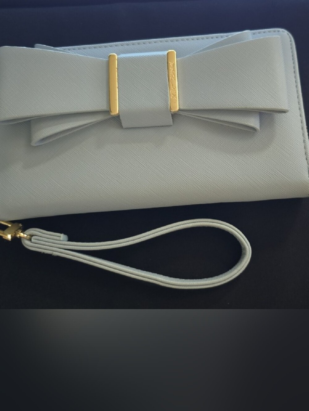Betsey Johnson Light Blue Bow Wristlet Clutch with Gold Accents